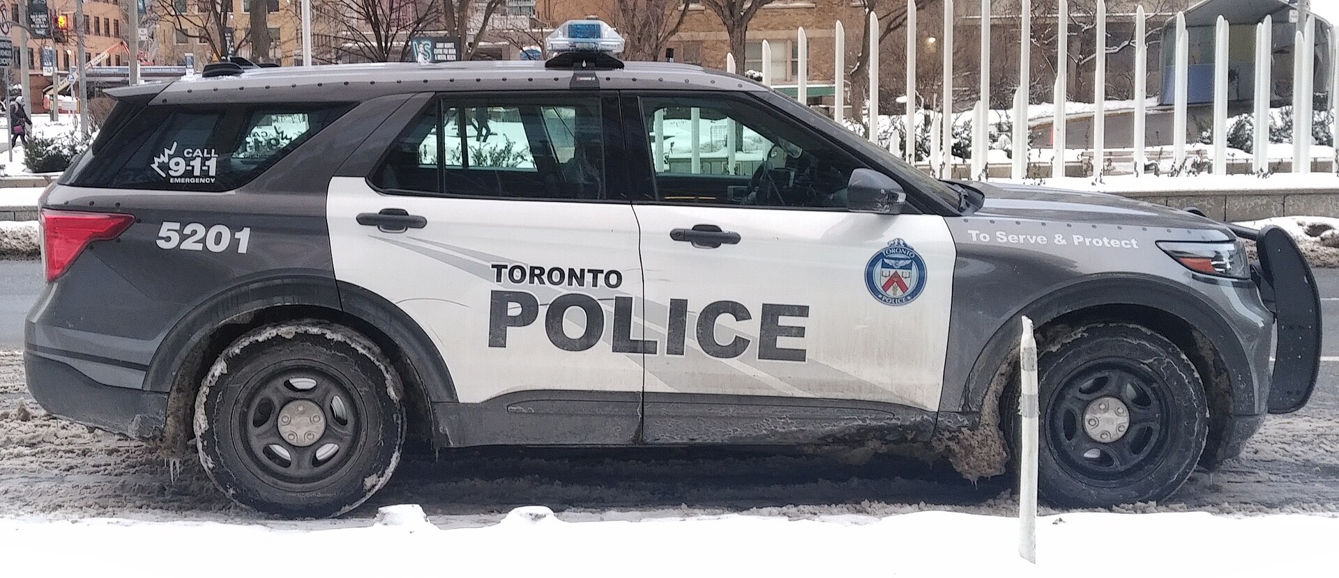 Toronto Police Service SUV in winter livery — To Serve and Protect